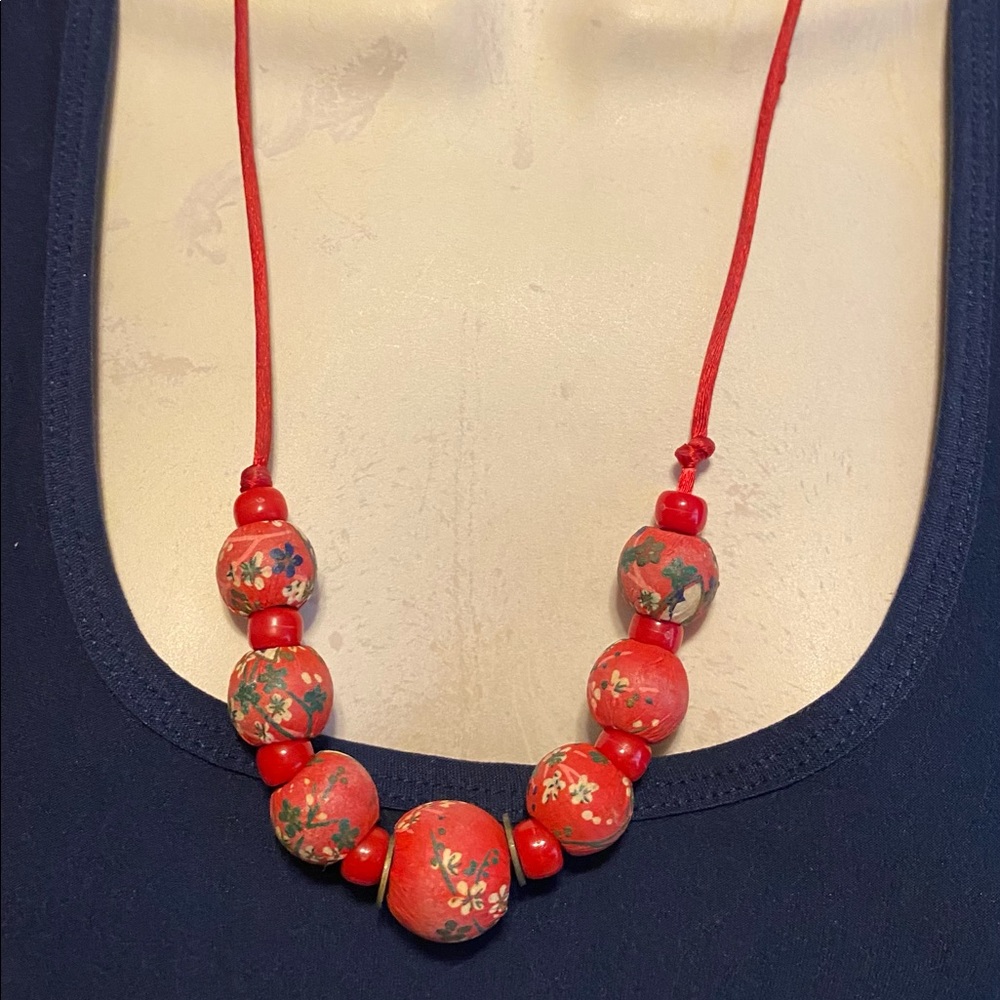 Red floral papier-mâché necklace
